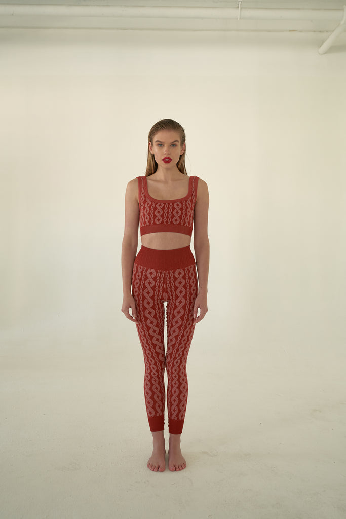 DISTRESSED CHARLIE CABLE KNIT LEGGING in CINNABAR